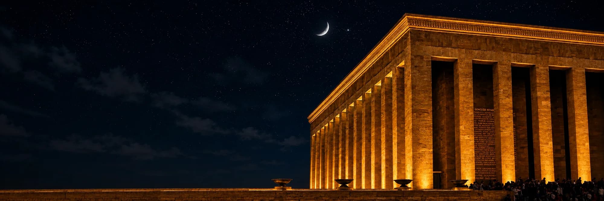Anıtkabir illuminated at night, with an artistically treated sky