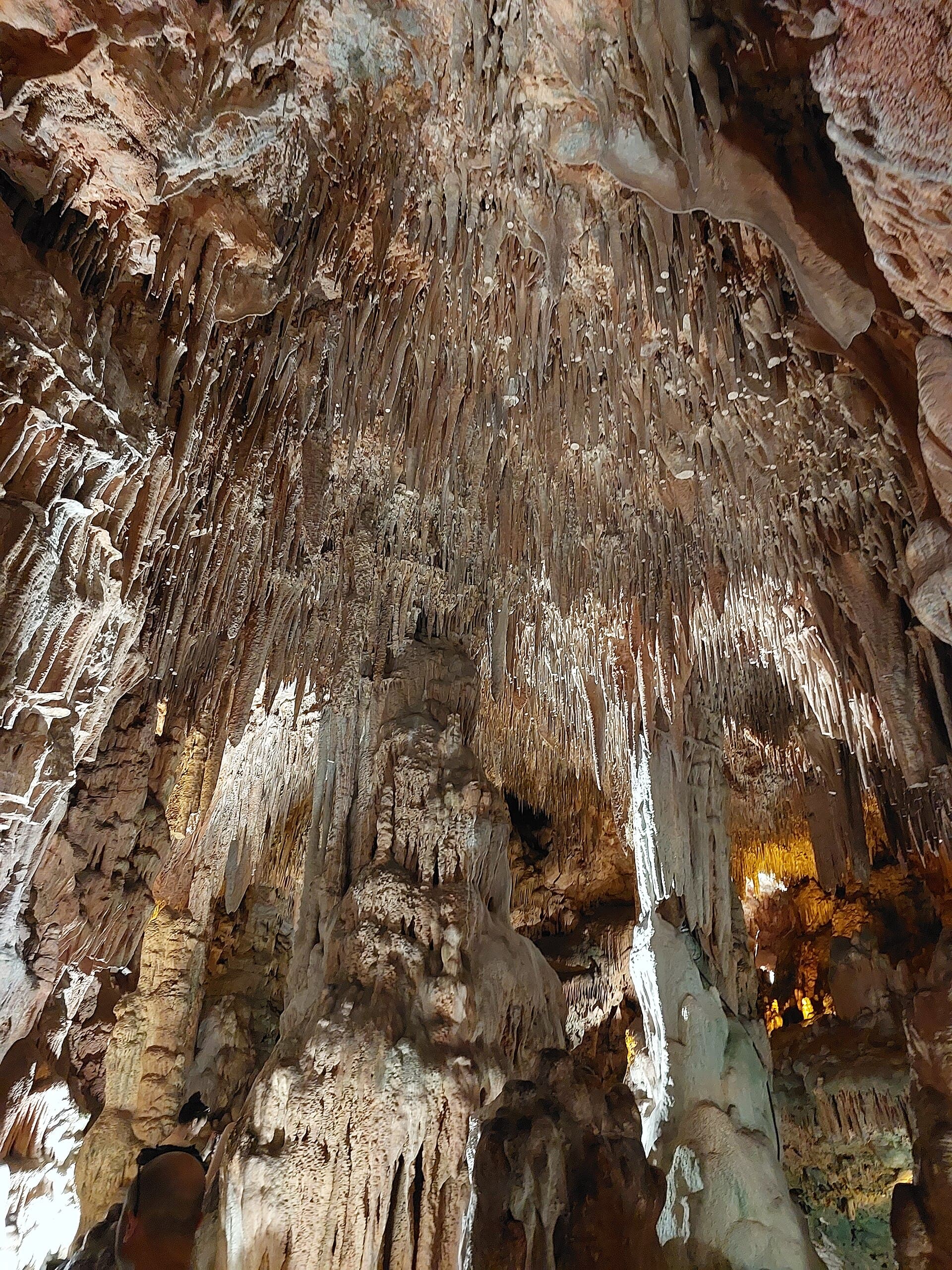 Stalactite and stalagmite formations inside Damlataş Cave, Alanya.