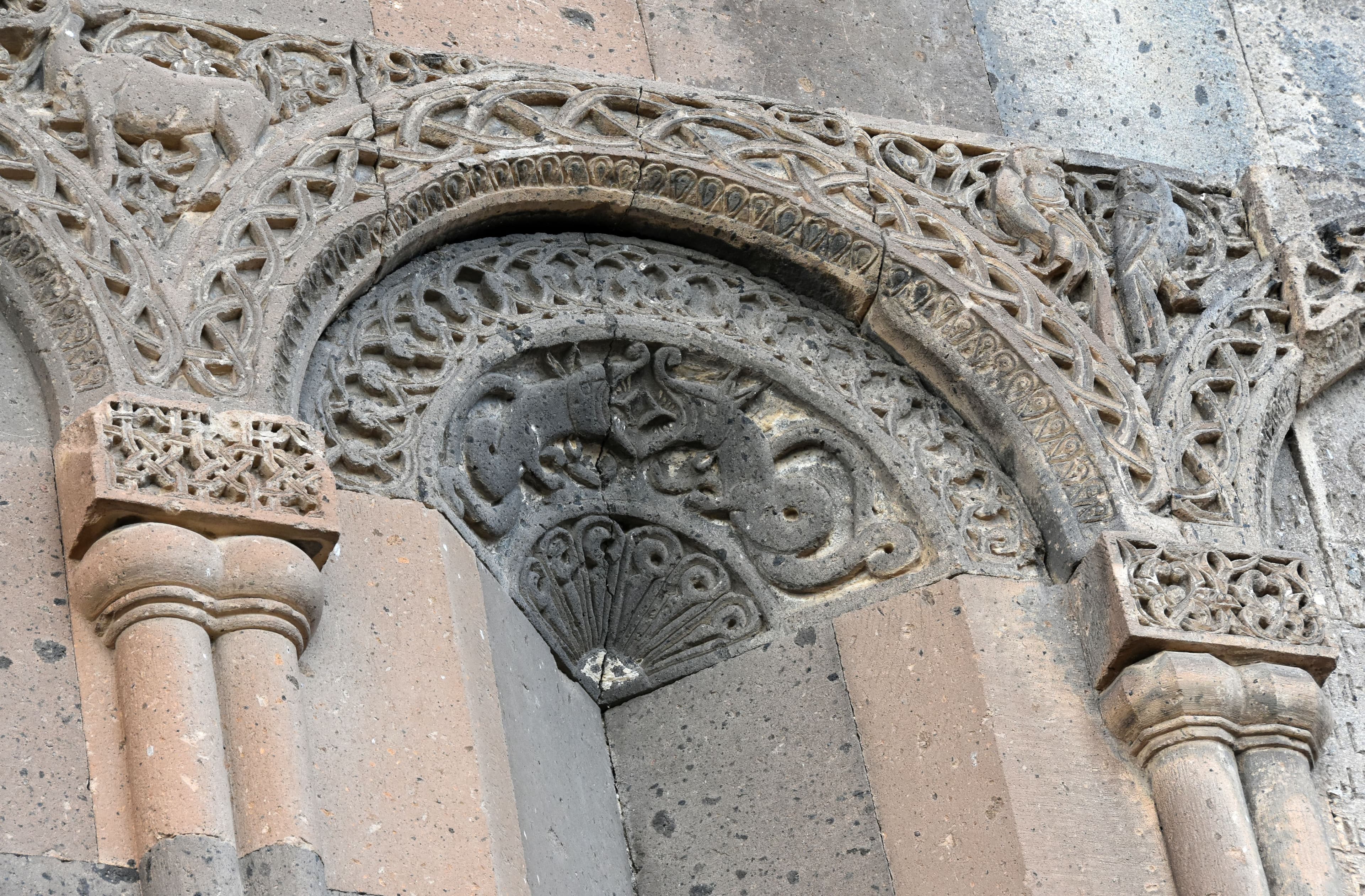 Carved dragon relief above a window on the Tigran Honents church, Ani