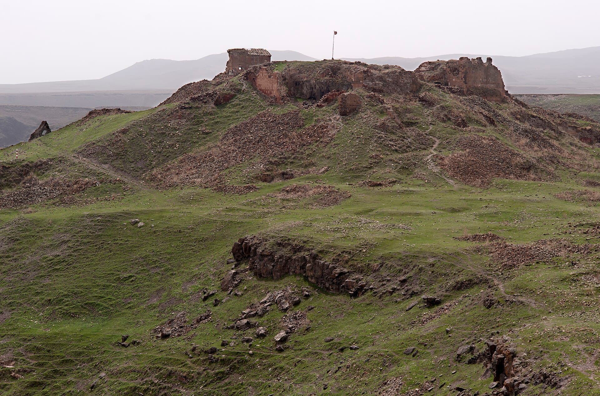 Distant view of Ani's ruined citadel walls across the plateau
