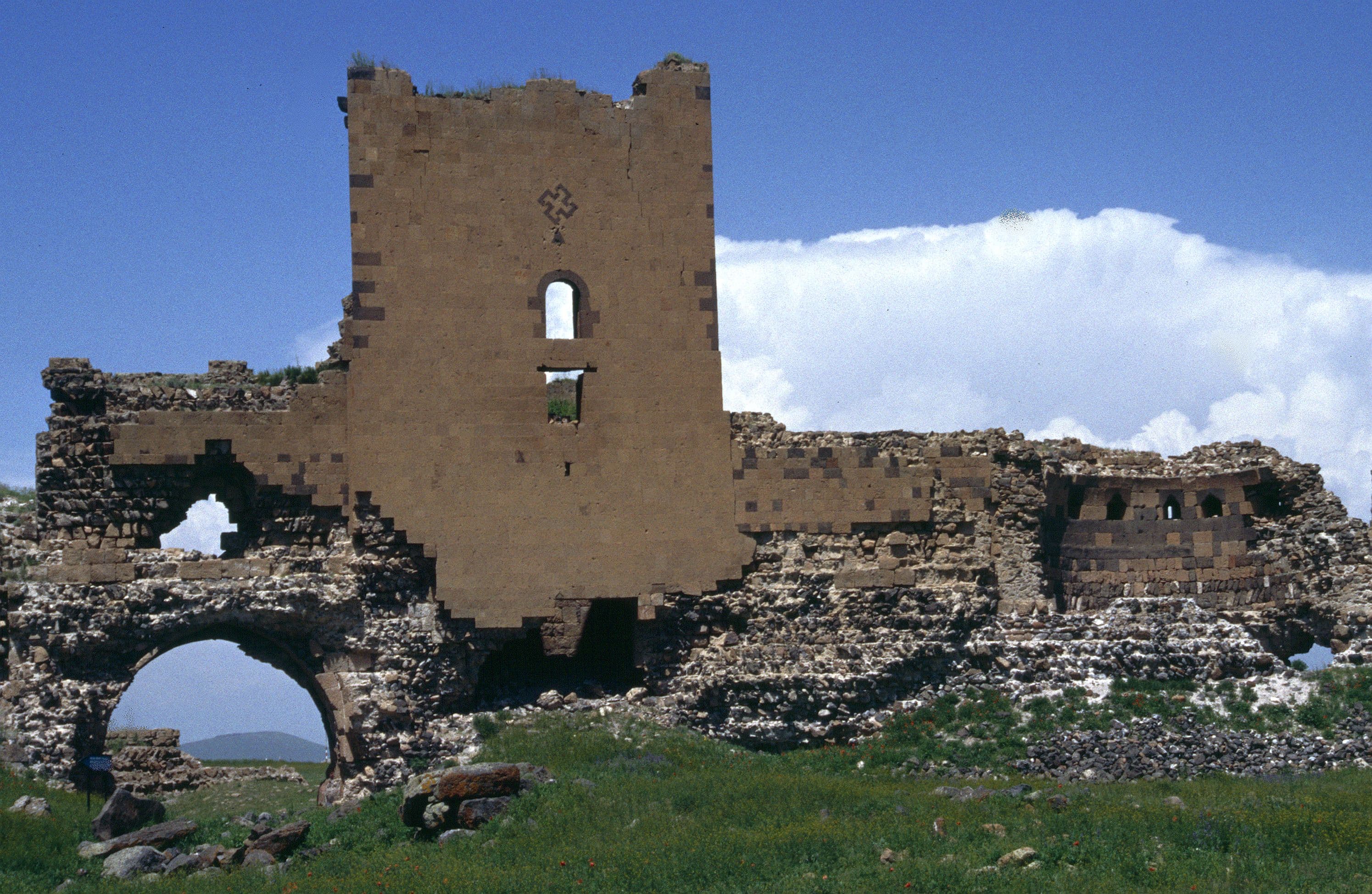 Ruined stone tower and arched gateway at Ani's fortified Lion Gate entrance