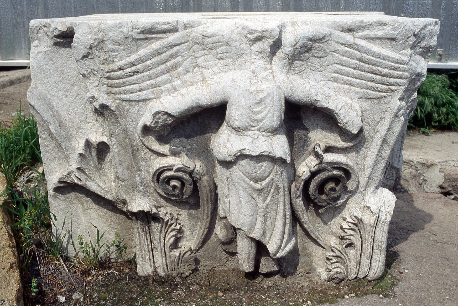 Close-up carved capital atop a surviving column of the Augustus Temple.