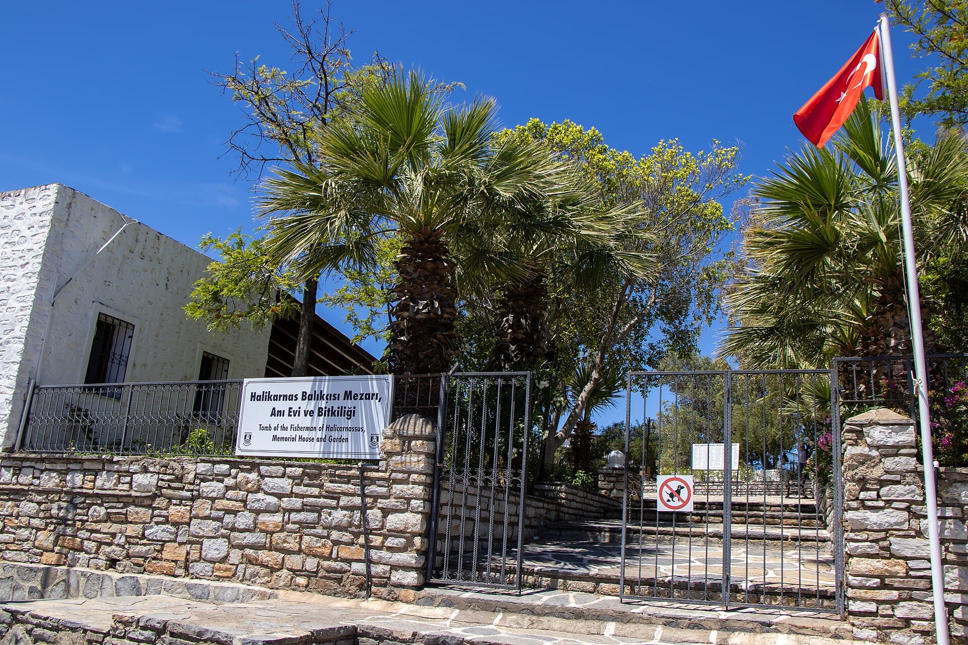 Grave, memorial house, and garden of Halikarnas Balıkçısı, Bodrum, in daylight.