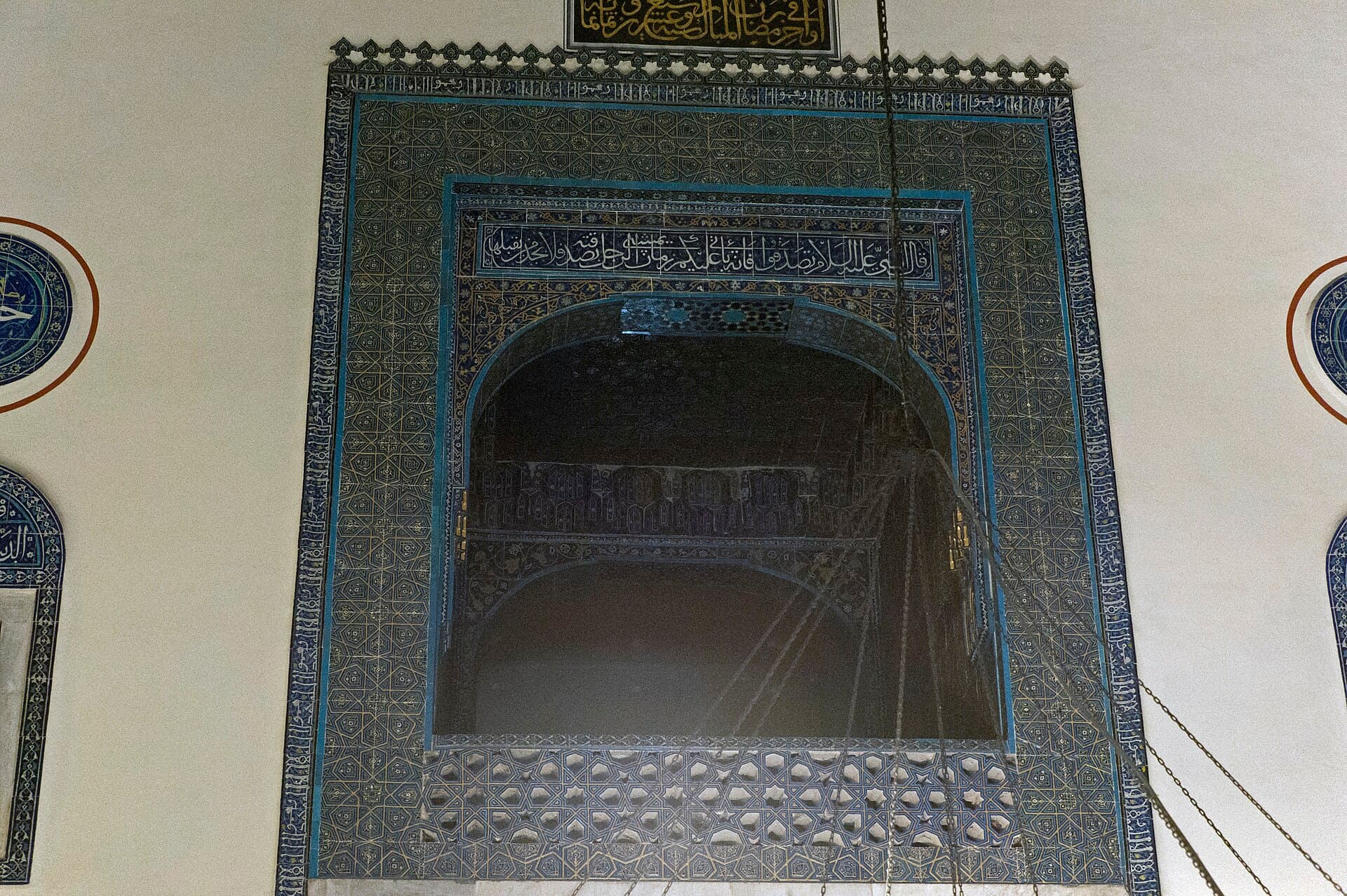 Tiled sultan's loge above the entrance inside Bursa's Green Mosque.