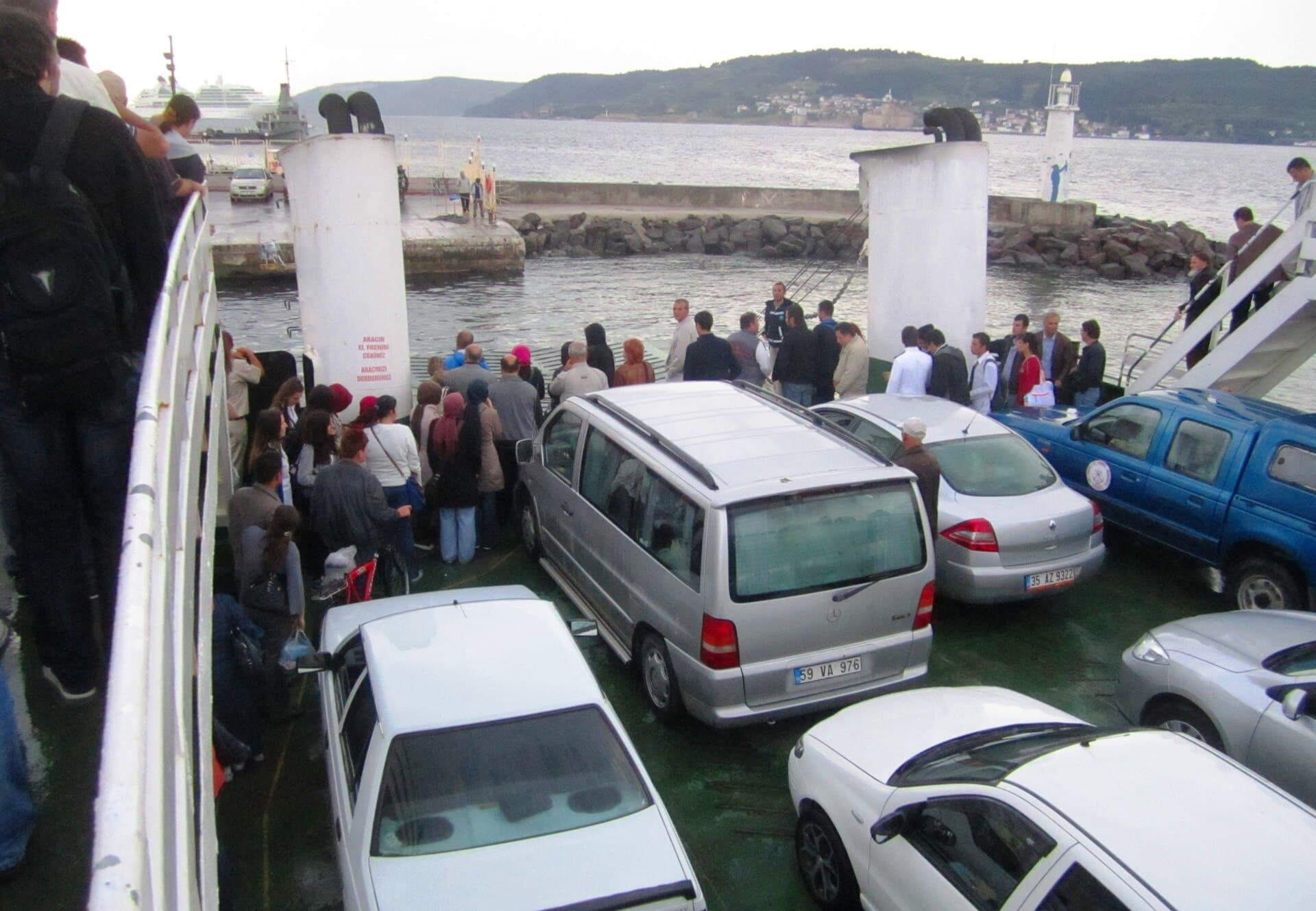 Cars loaded on the Çanakkale ferry, ships visible on the Dardanelles Strait