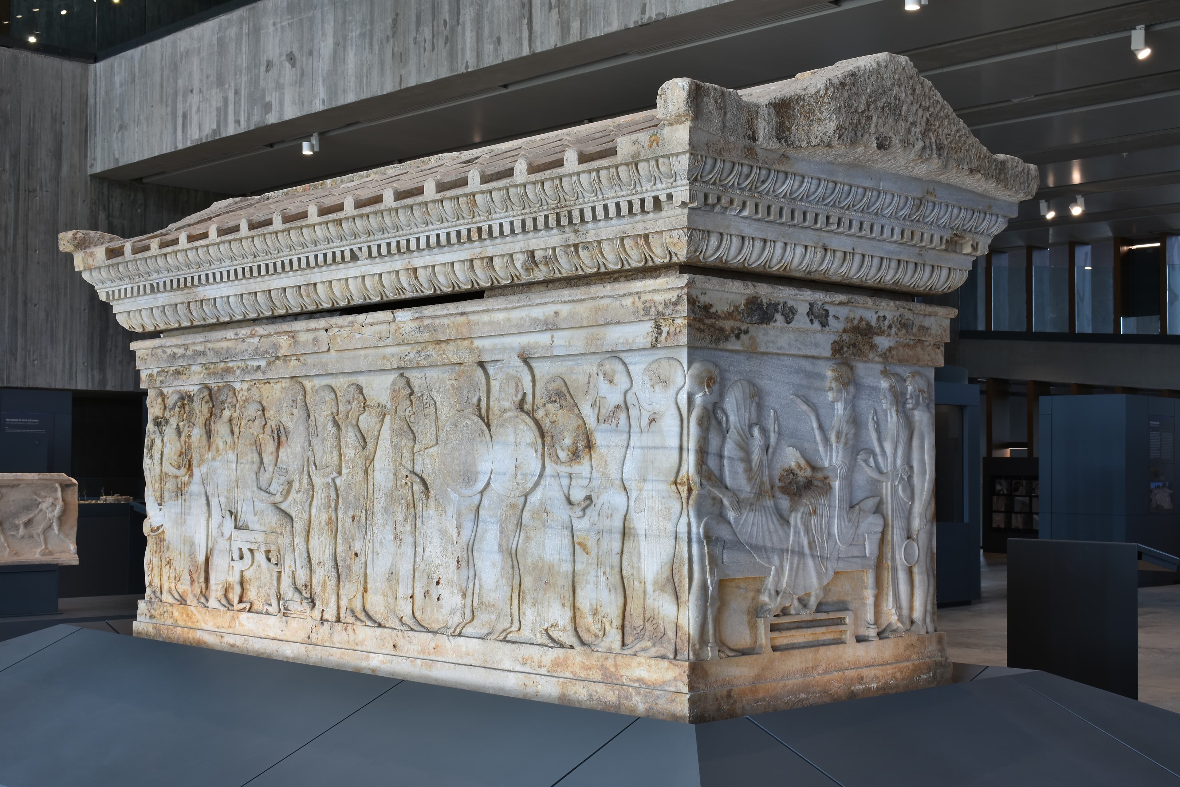 The carved Polyxena Sarcophagus on display in the Troy Museum's gallery
