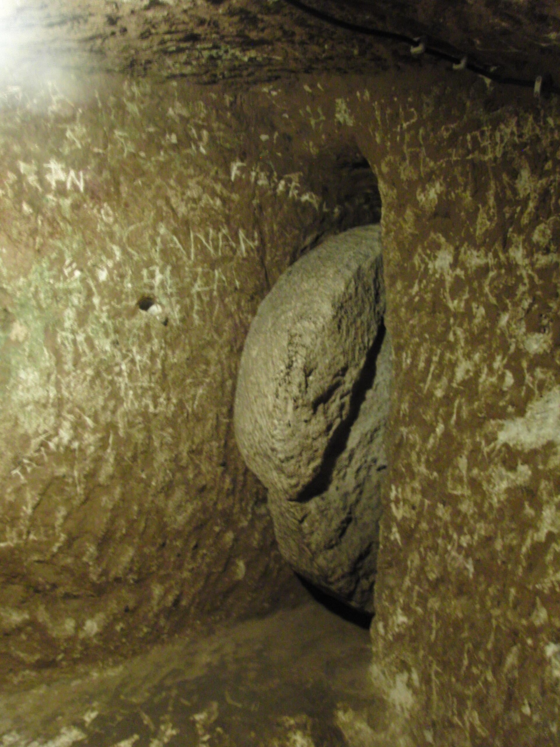 A round rolling stone door carved to seal a tunnel passage in Derinkuyu Underground City