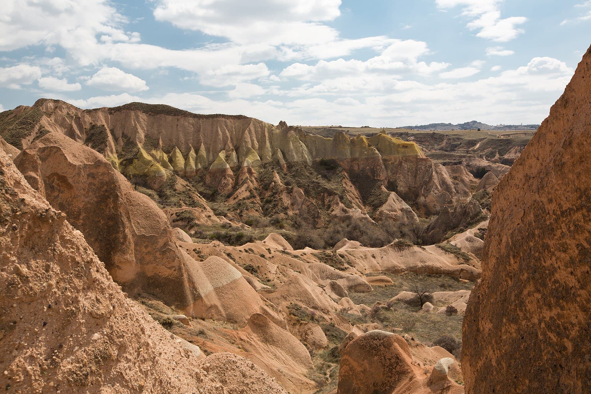 Panoramic view of the pink-hued tuff rock formations of Rose Valley (Güllüdere) in Cappadocia