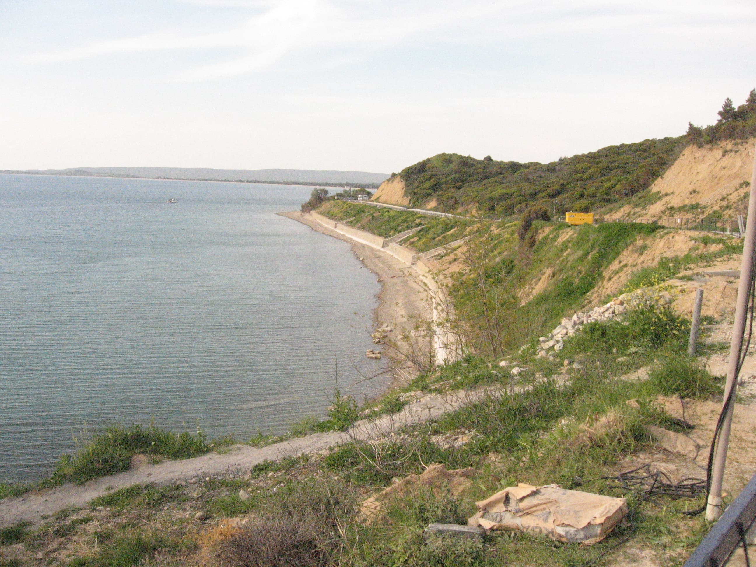 Anzac Cove's narrow beach and steep cliffs, looking north toward Ari Burnu