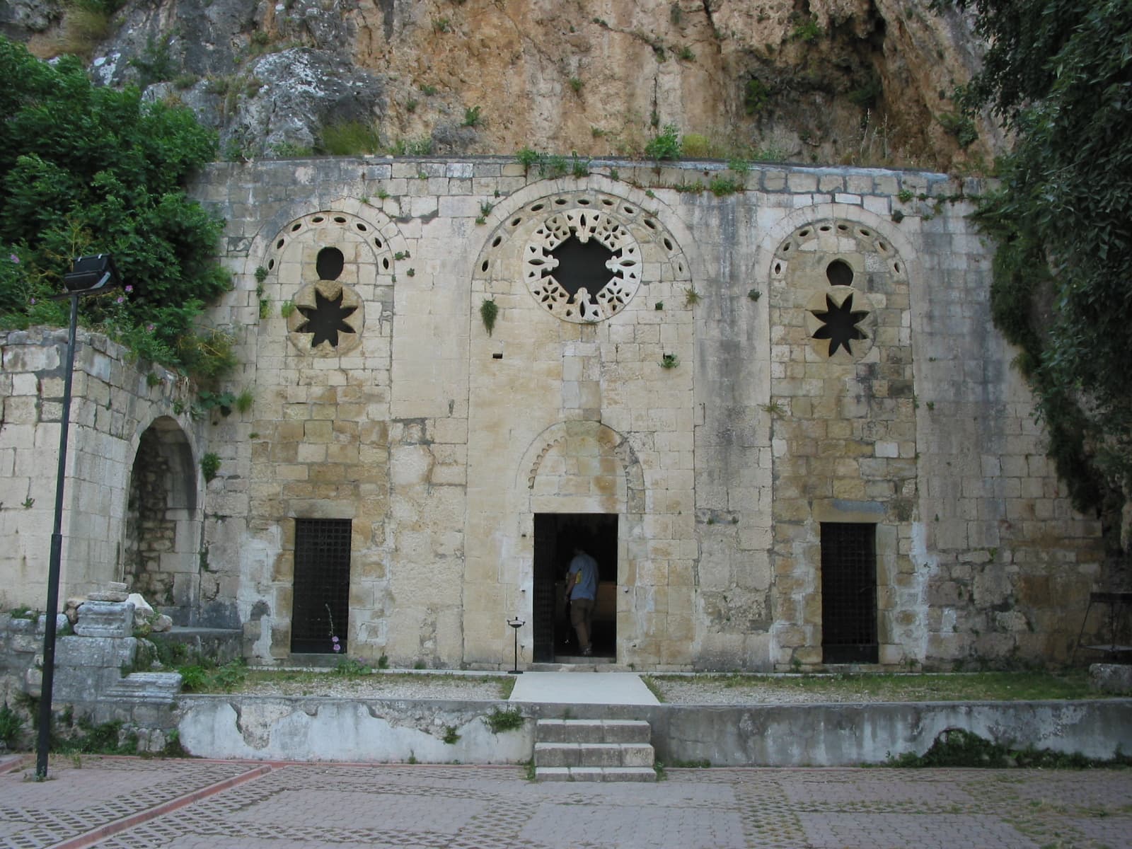 Front facade of St Peter's Cave Church in Antakya, its Gothic entrance rebuilt in 1863.
