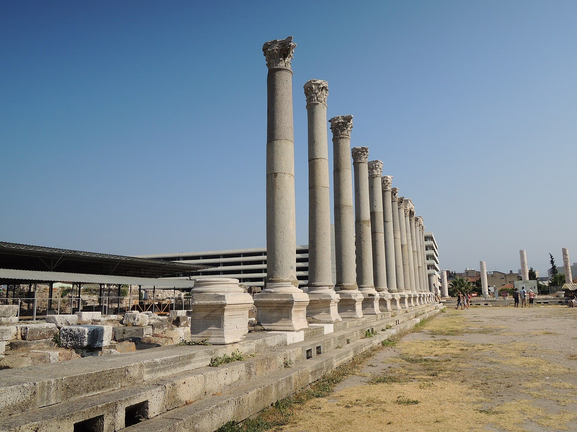 Sunlit western stoa colonnade at the Agora of Izmir ruins.
