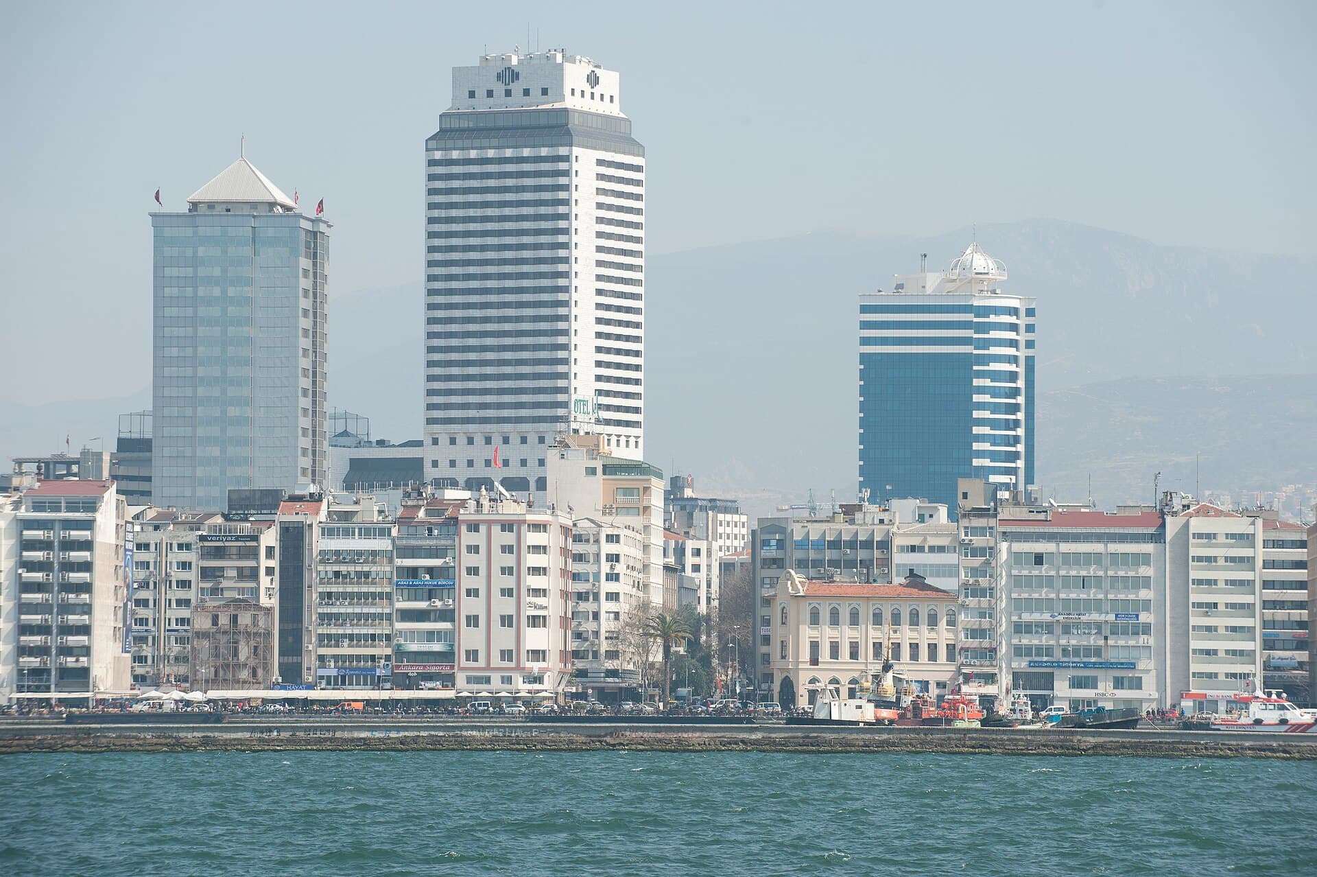 View of İzmir skyline and Kadifekale from the Karşıyaka ferry deck.