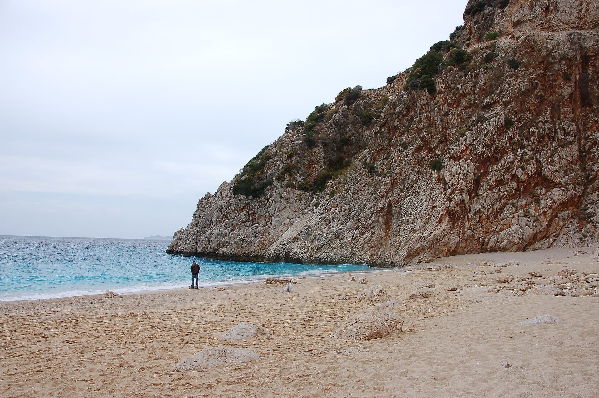 Small turquoise cove of Kaputaş Beach viewed from close to the shoreline.
