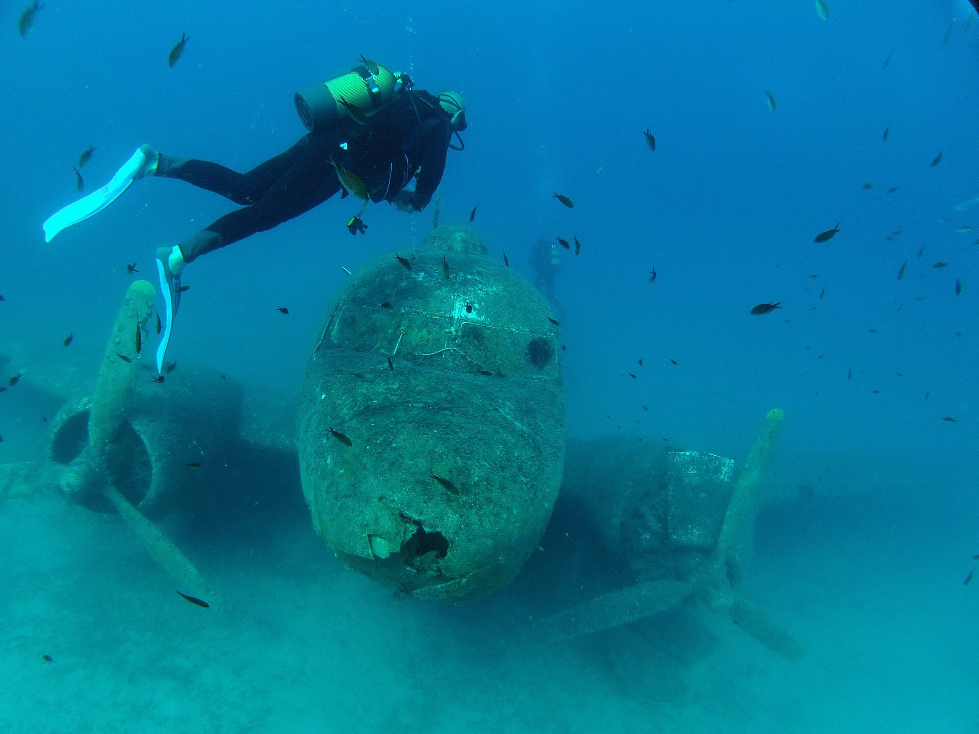 Sunken C-47 Dakota aircraft wreck's nose section resting on the seabed near Kaş.