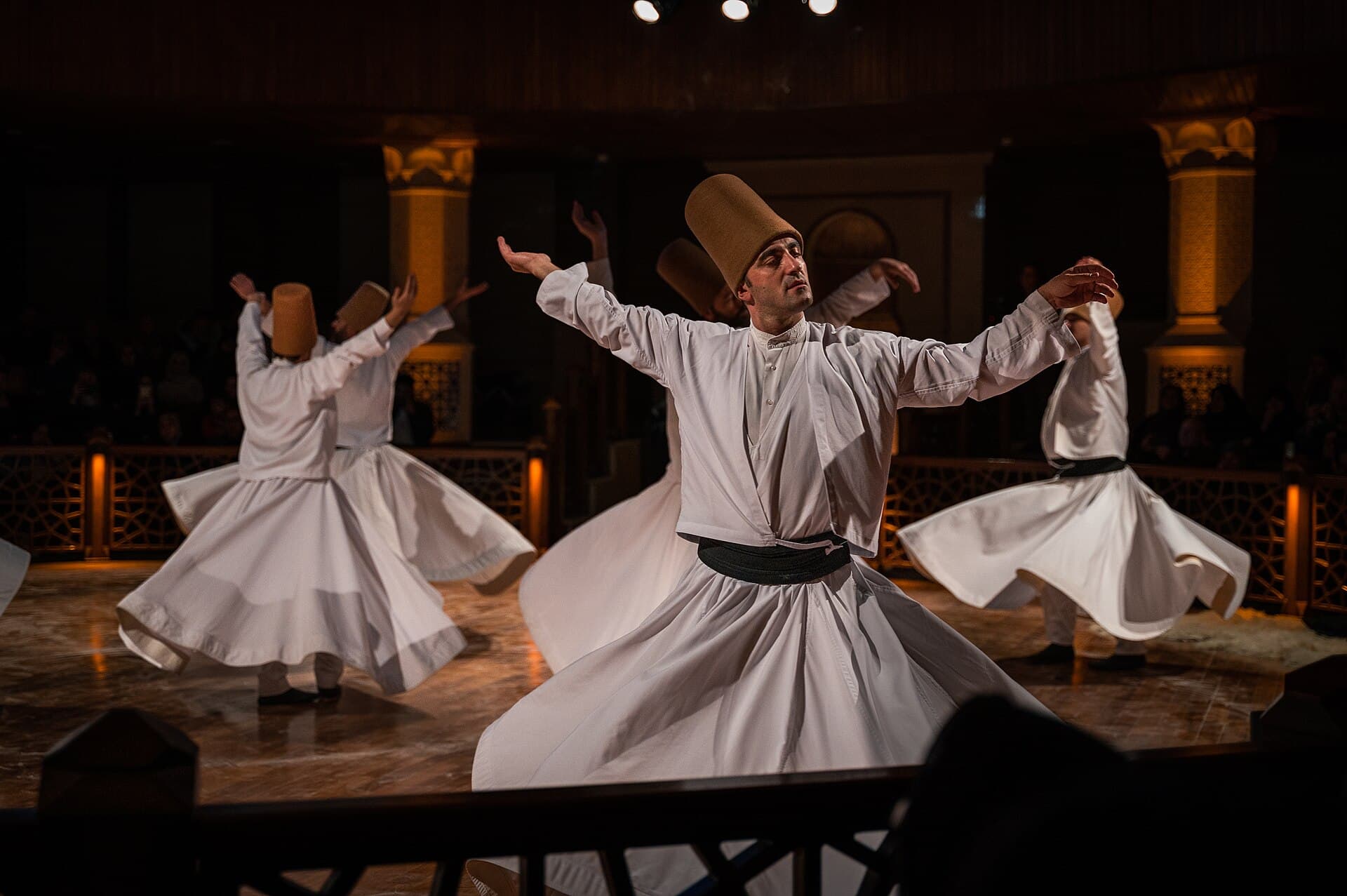 Mevlevi semazens turning during a Sema ceremony performance in Konya, Turkey.