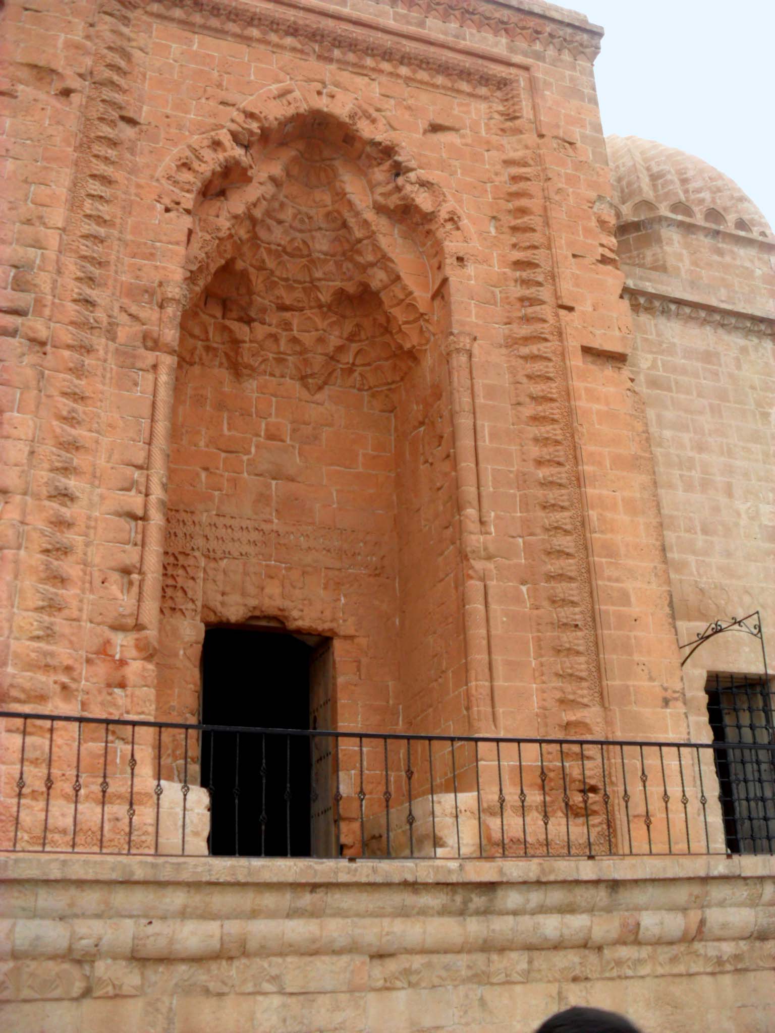 Stone entrance portal of the Kasımiye Medresesi in Mardin, Türkiye.
