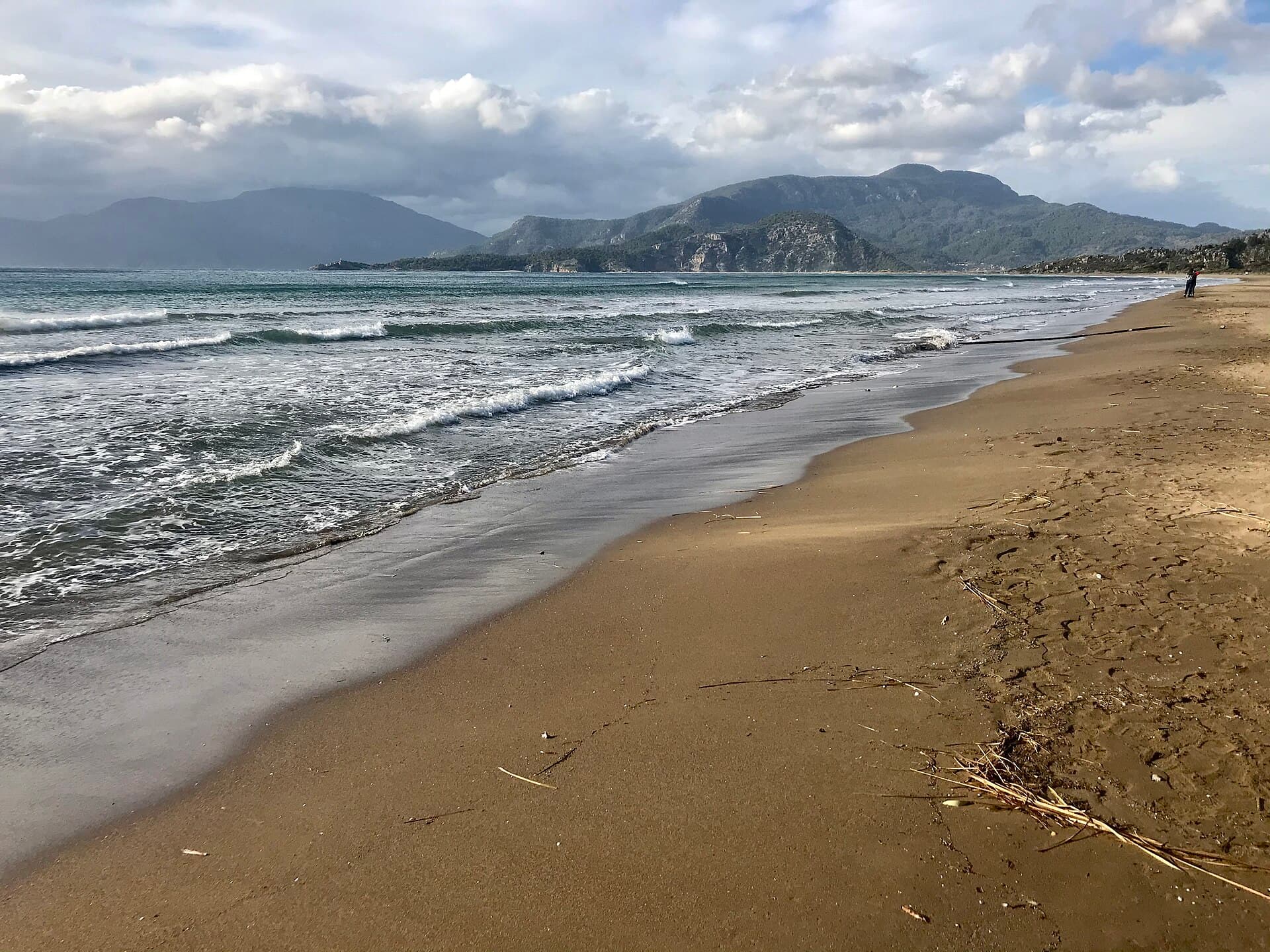 Waves breaking on İztuzu Beach's sandy shore near Dalyan, Turkey