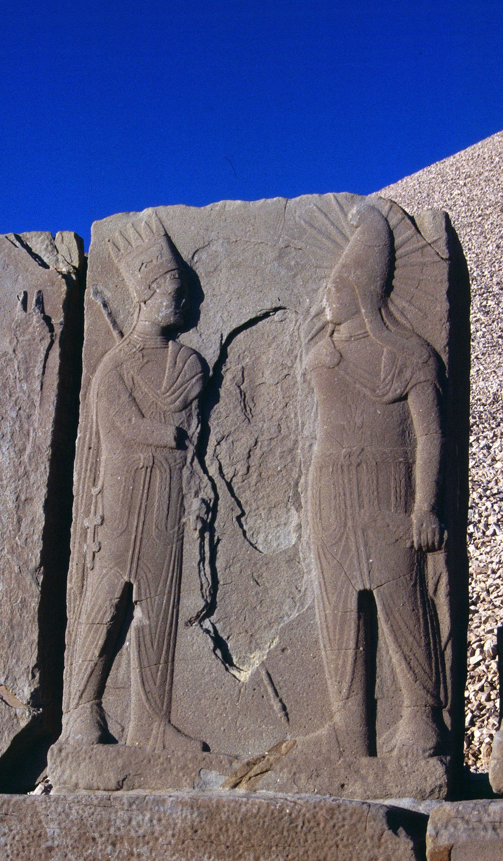 Well-preserved dexiosis relief of two royal figures shaking hands, Nemrut's West Terrace