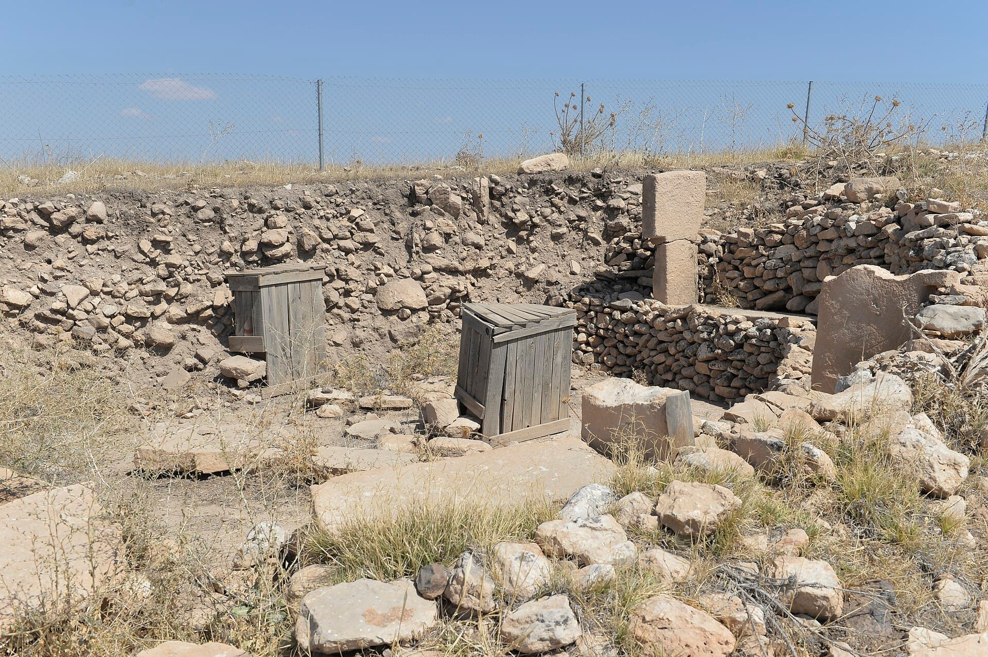 Excavated central T-shaped pillars inside Göbekli Tepe's oval Building F enclosure.