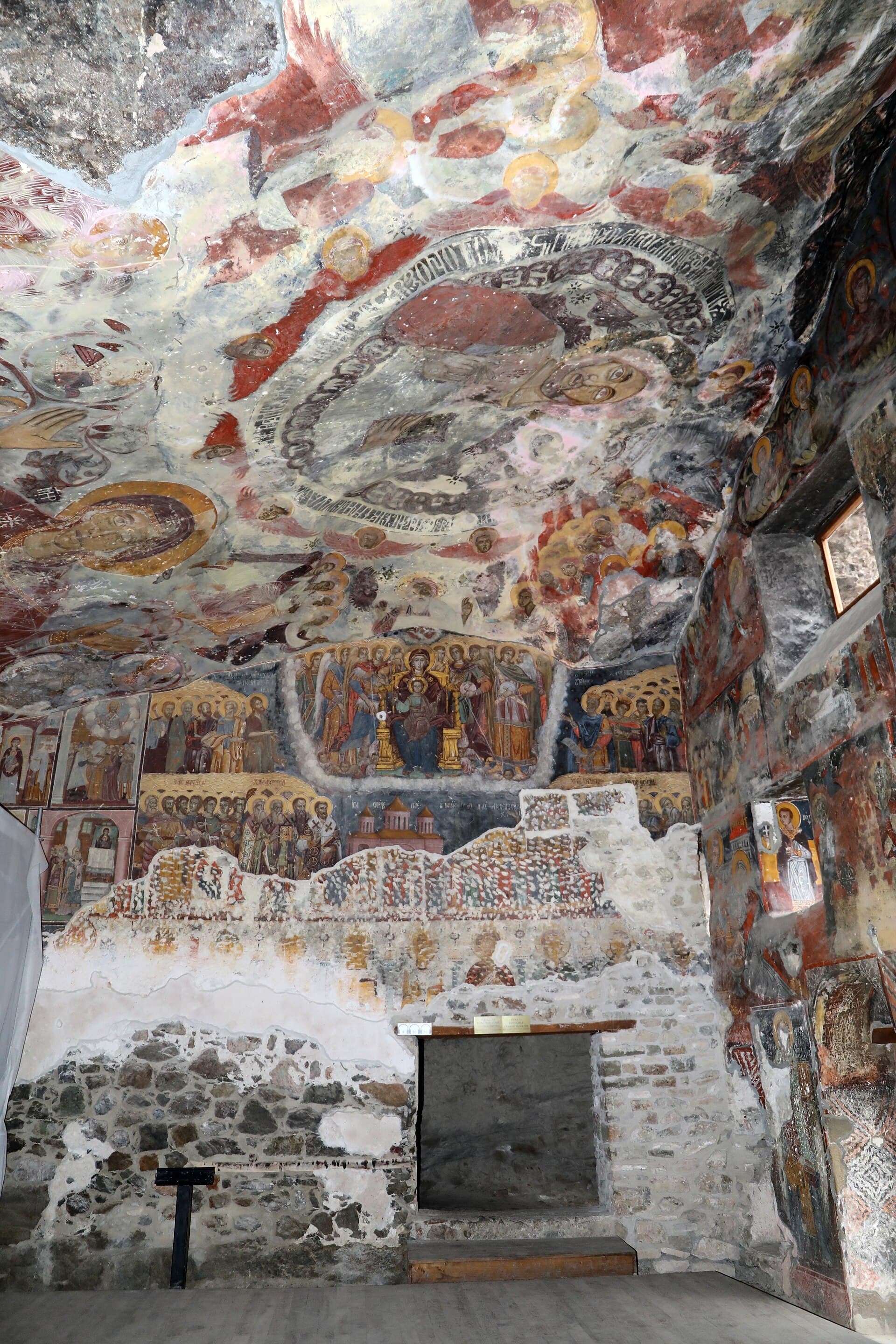 Close-up fresco of the enthroned Virgin and saints inside Sümela's rock-cut ceiling