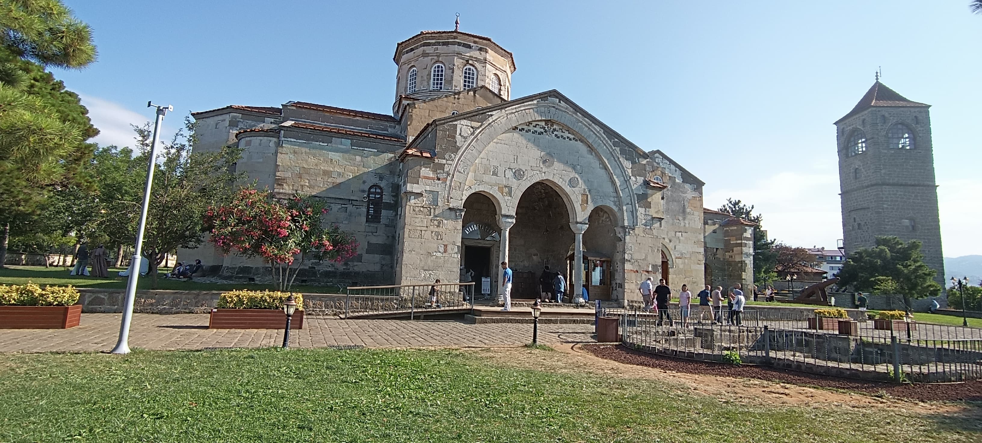 North facade of Hagia Sophia in Trabzon with its detached Byzantine bell tower.